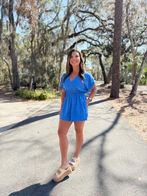 Jet To The Tropics V Neck Waisted Romper in Blue