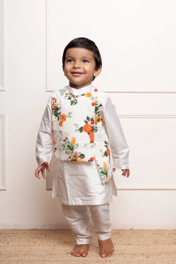 Stylish white kurta set with a attached vibrant floral asymmetrical jacket for a festive and modern look